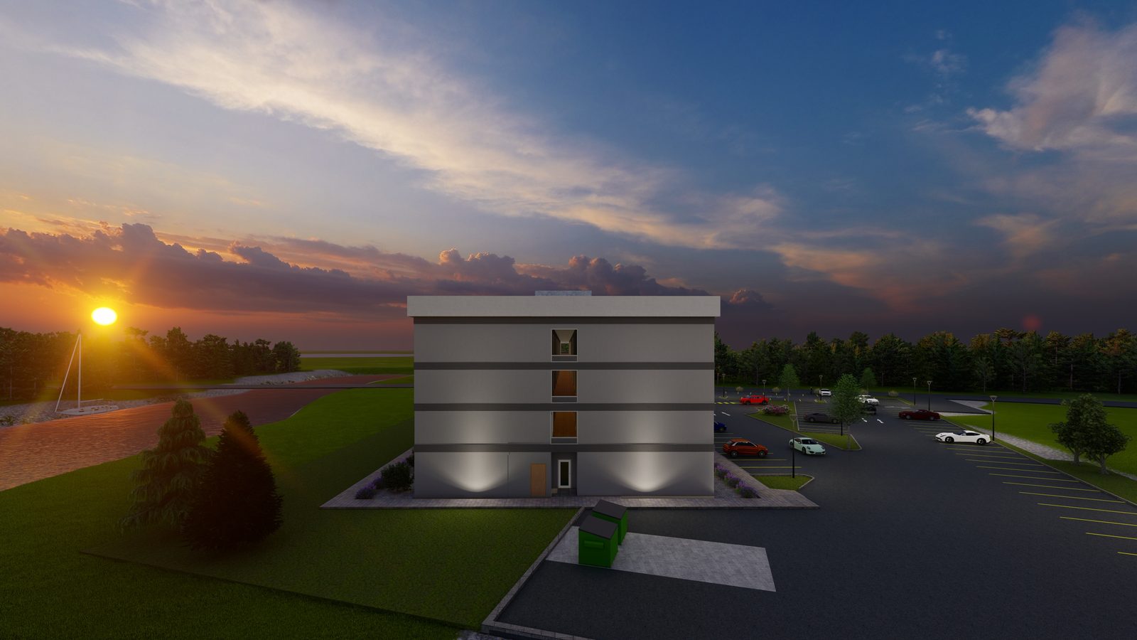 End elevation of the hotel at sunset beside a marina with a sailboat.