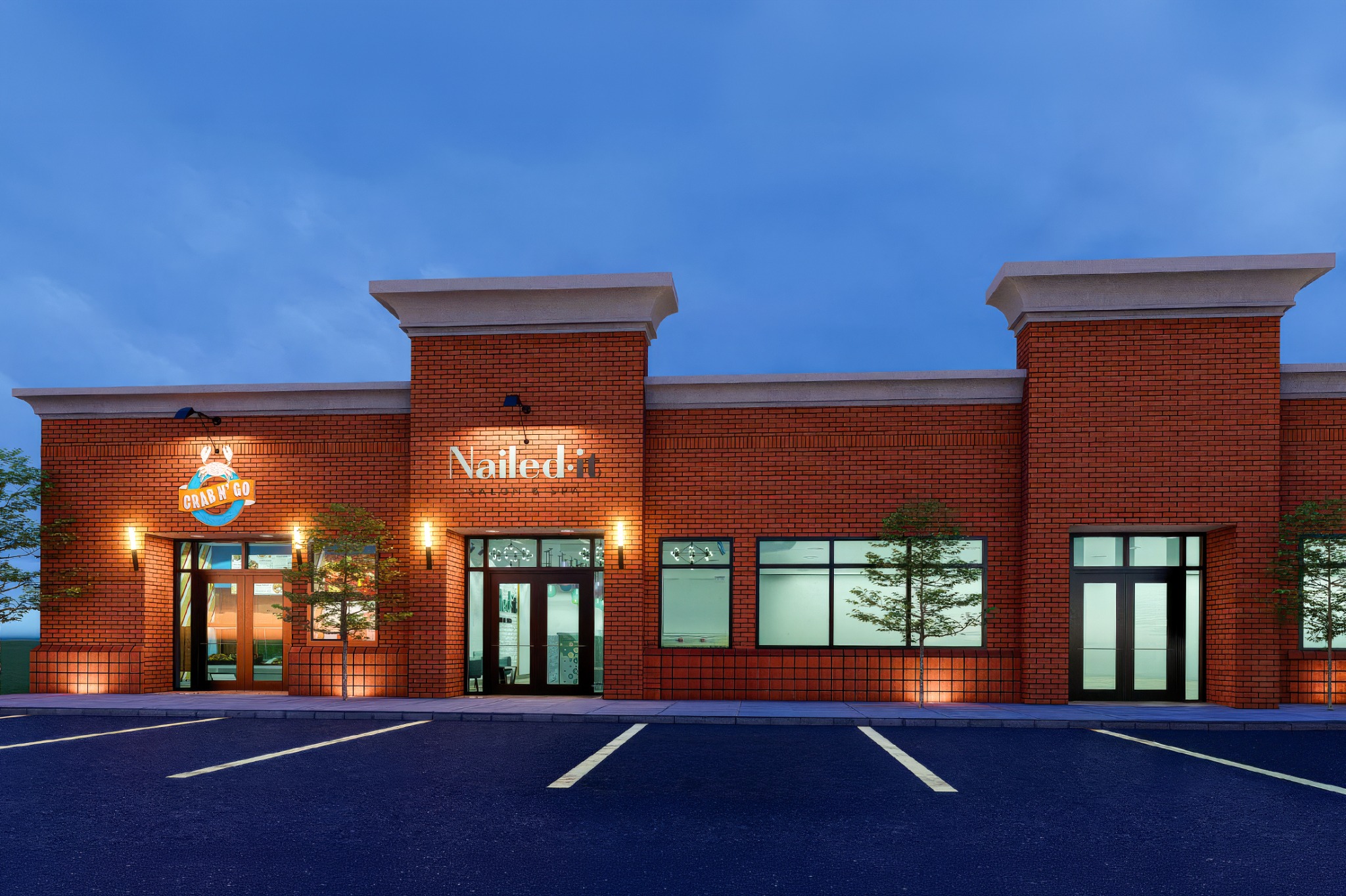 Mixed-use retail storefront at dusk