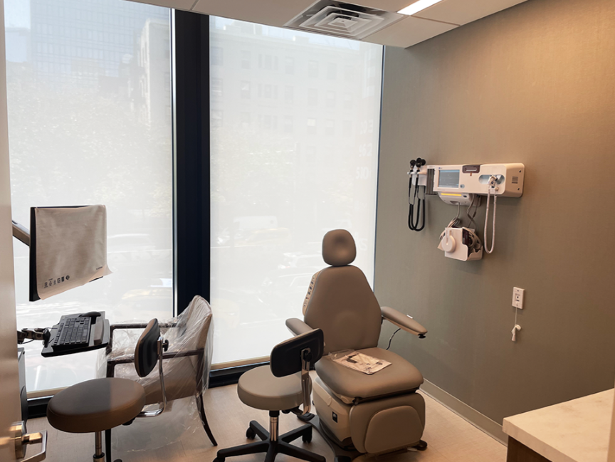 Mount Sinai exam room with full-height street-facing glazing