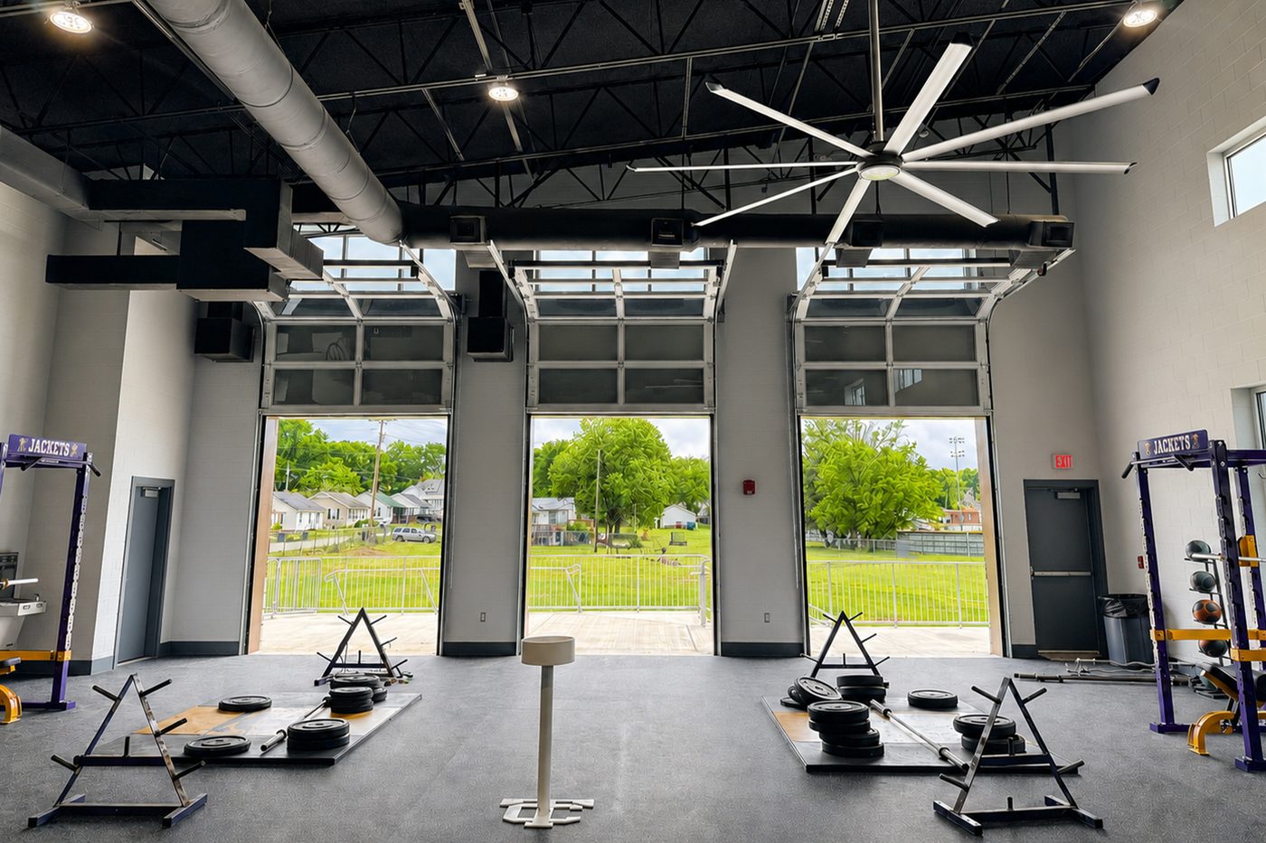 Weight room opening toward the athletic field